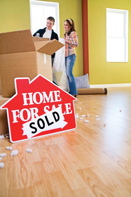 Happy homebuyers settling into their new home